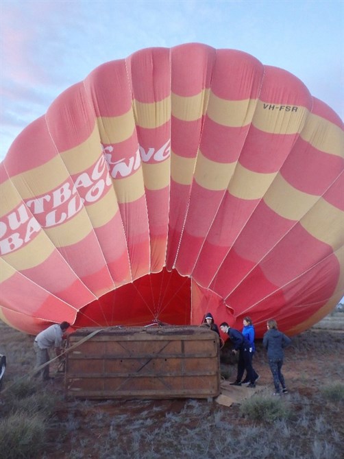 Figure 7: Passengers pre-loading into the side of the basket furthest from the inflation fan (Note: the pilot on the left side adjusting the fan’s position)